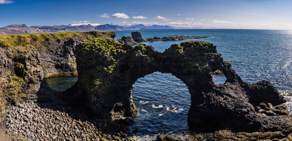 Panorama of the sea arch at Arnarstapi Cliffs on the Snaefellsnes Peninsula, Iceland