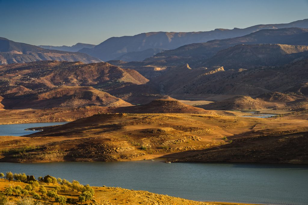Sunset over the lake and Atlas Mountains at Bin El Ouidane, Morocco