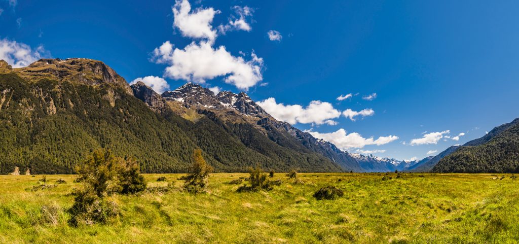 Spring panorama over the mountains at Eglington Valley, Southland, South Island, New Zealand
