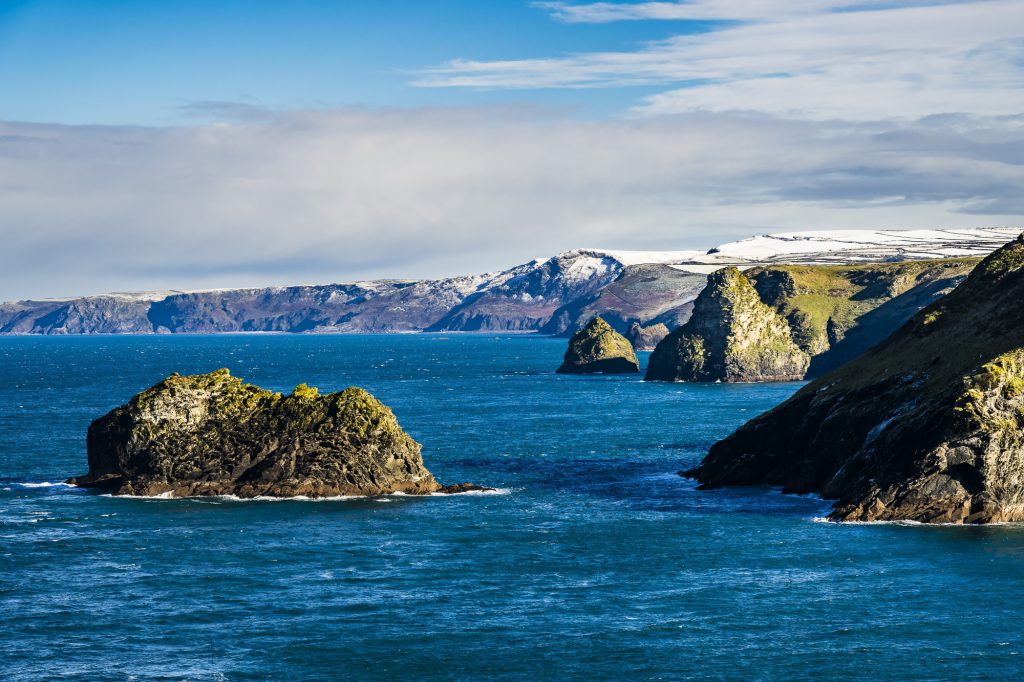Autumn snow over the cliffs, looking from Barras Nose towards Gullastem, near Tintagel, Cornwall