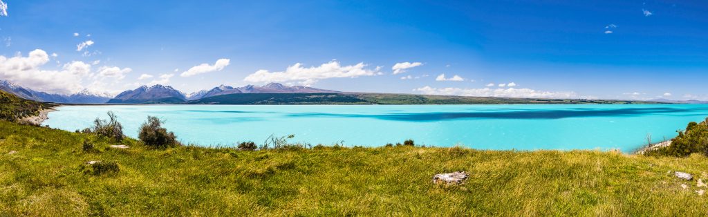 Panorama over the mountains and Lake Pukaki, with Mount Cook and Mount Tasman, Canterbury, South Island, New Zealand