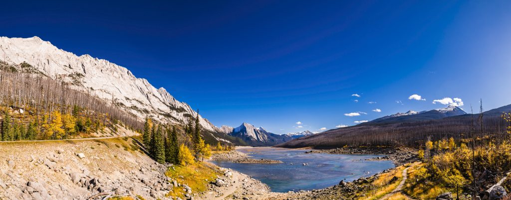 Autumn panorama at Medicine Lake in the Rocky Mountains near Jasper, Alberta, Canada