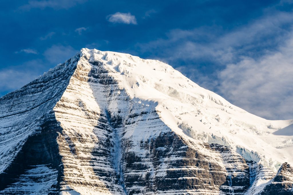 Snowy autumn peak of Mount Robson in the Rocky Mountains, British Columbia, Canada