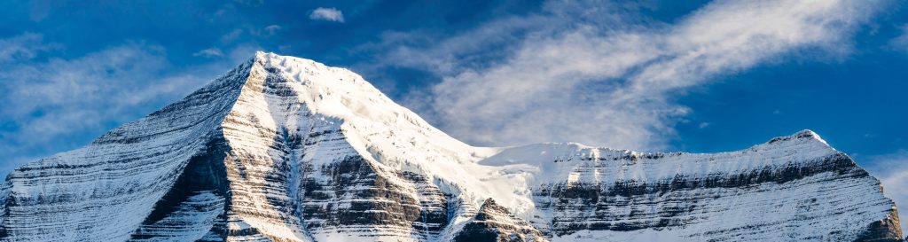 Panorama of the snowy autumn peaks of Mount Robson in the Rocky Mountains, British Columbia, Canada