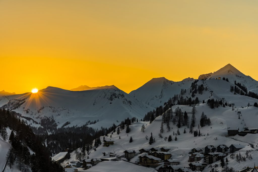 Sunset over the snowy Alp mountains at Obertauern, Austria
