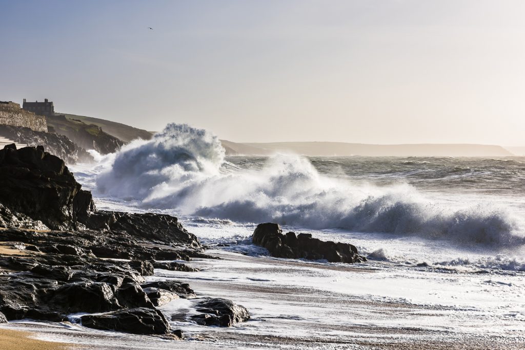 Crashing waves and surf at Porthleven beach, near Penzance, Cornwall