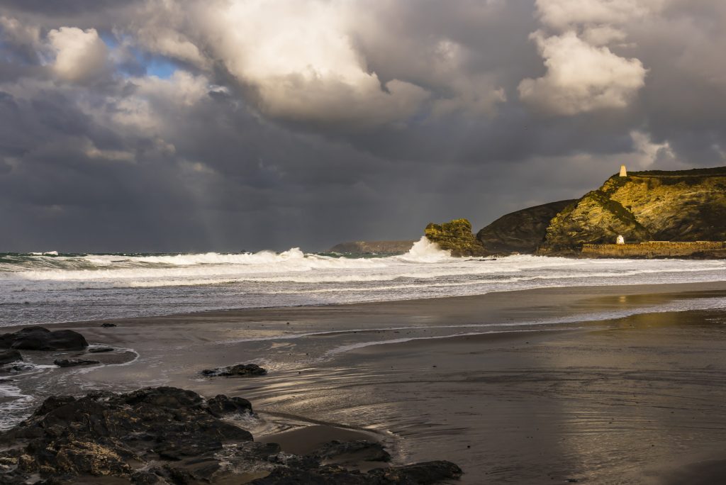 Stormy autumn weather with waves and surf at Portreath beach, Cornwall