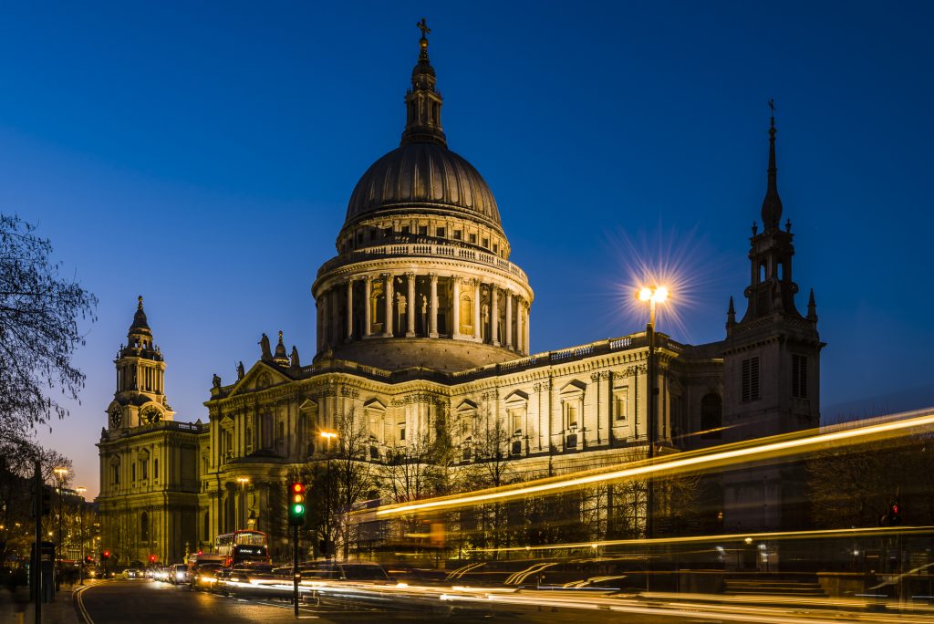 Light trails at dusk in winter at the side of St Paul's Cathedral, London