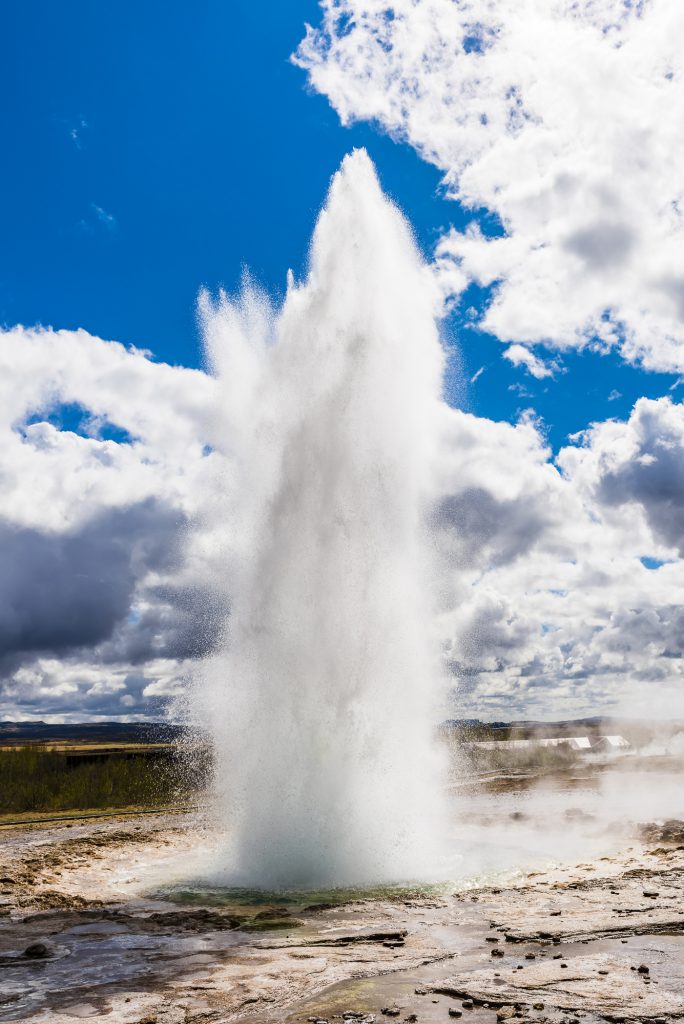 Water spout erupting from the volcanic geyser at Strokkur Geysir, Iceland