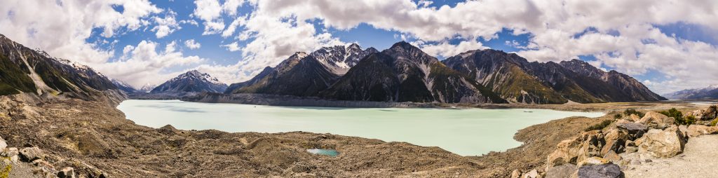Panorama over the mountains, icebergs in Tasman Lake and the Tasman Glacier, near Mount Cook, Canterbury, South Island, New Zealand