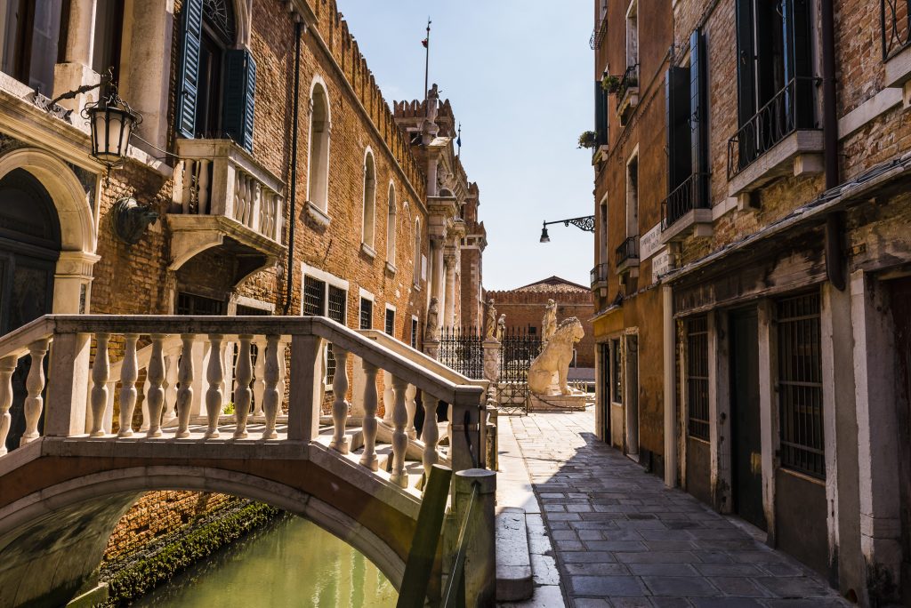 Early morning light on the canal and bridges near the Arsenale, Venice, Veneto, Italy
