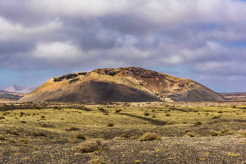 The volcano and mountains at Volcan El Cuervo, Lanzarote, Spain