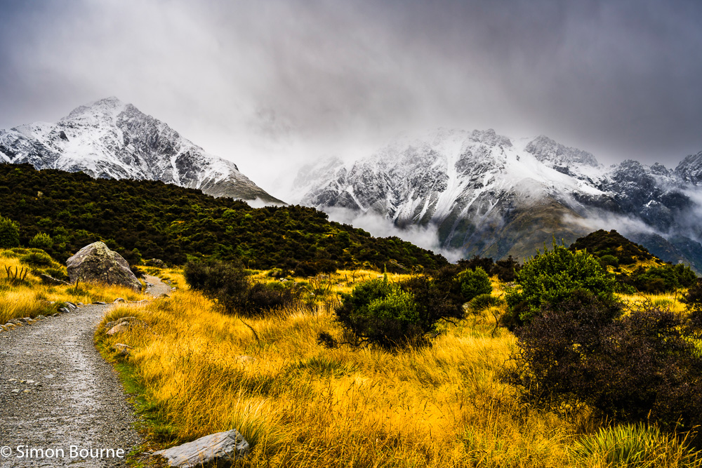 Early morning autumnal landscape and first snow in the Tasman River valley near Mount Cook, Canterbury, South Island, New Zealand