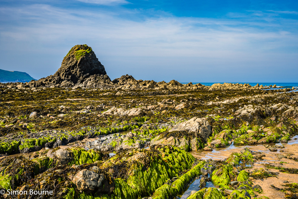 Black Rock sea stack and rock formations at Widemouth Sand beach, Cornwall